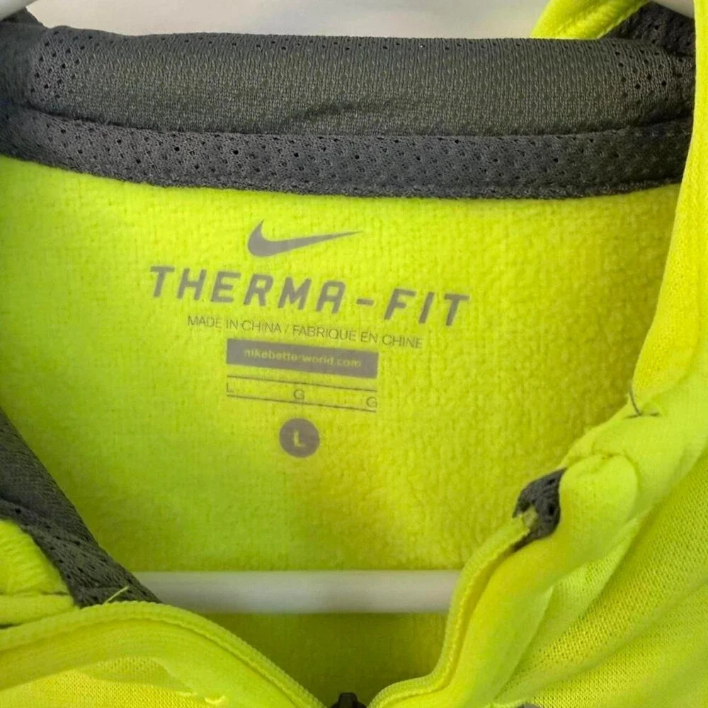 Nike Therma-Fit Hoodie in neon yellow with black camouflage Nike logo, size yout